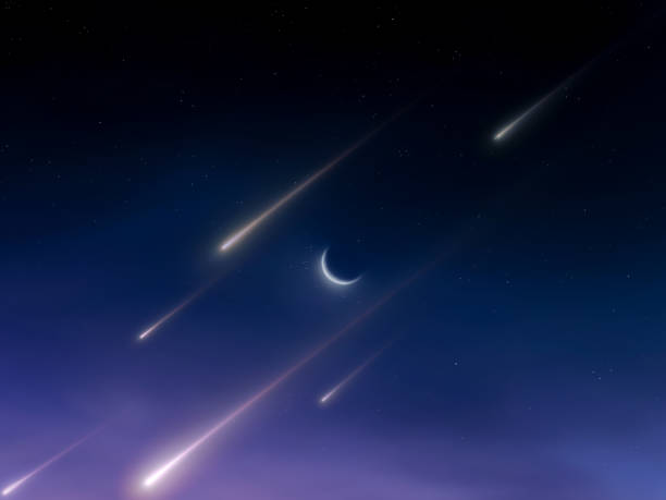istock Falling stars in the sky near the moon. 2203058505