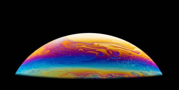 istock Half of colorful soap bubble on black background. 2203060195