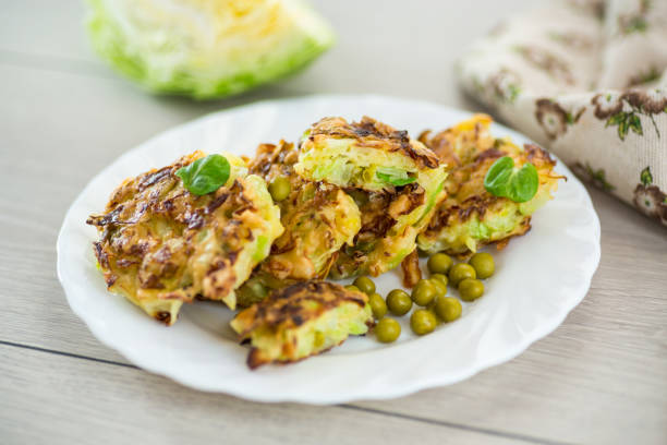 istock vegetable cabbage pancakes on a wooden table 2203060278