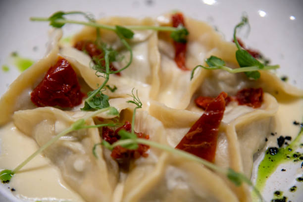 istock Gourmet ravioli served in a fine dining restaurant with vibrant toppings 2203063470