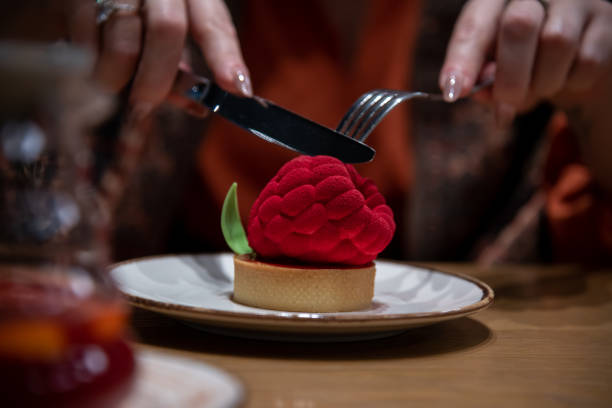 istock Delightful dessert experience at a cozy cafe during evening hours 2203063655