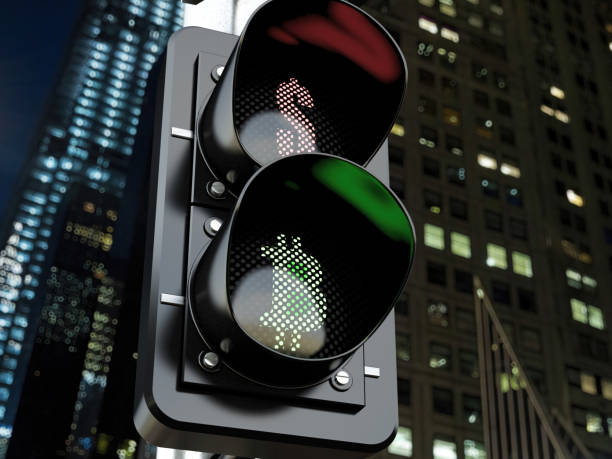 istock Bitcoin and Dollar in Traffic Lights at Night 2203065001