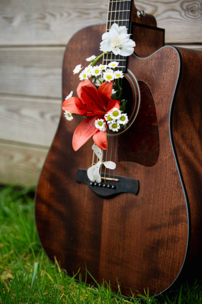 istock Guitar Blossoms in Nature s Embrace 2203067779