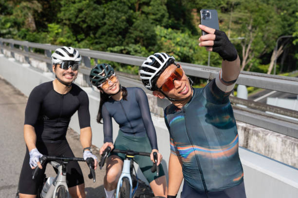 istock Group of Asian Cyclists taking a selfie in Singapore 2203067899