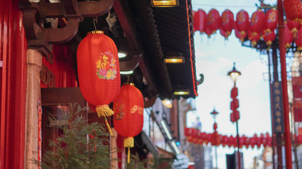istock Symbolic Chinese red lanterns hanging in a row, representing prosperity 2203068692