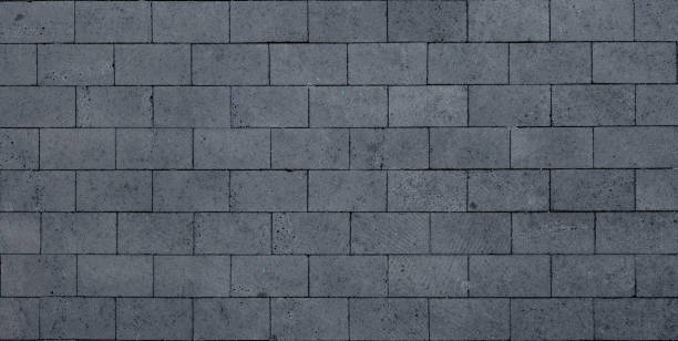 istock Concrete tile floor texture in brick pattern, urban paving 2203070745