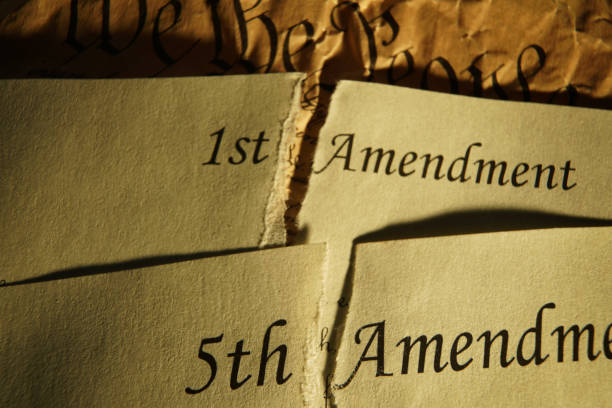 istock The First and Fifth Amendments ripped in half and the US Constitution 2203071172