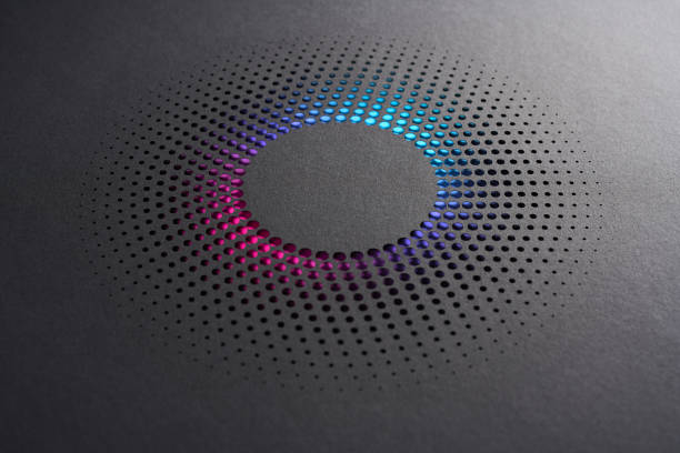 istock Modern paper cut artwork with circular perforations revealing vibrant pink and blue gradient lighting underneath 2203071738