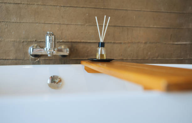 istock elegant bathroom countertop with reed diffuser and warm lighting 2203073867