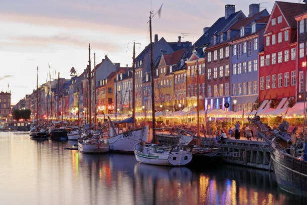 night time view of Nyhavn - the canal district of Copenhagen (Denmark).