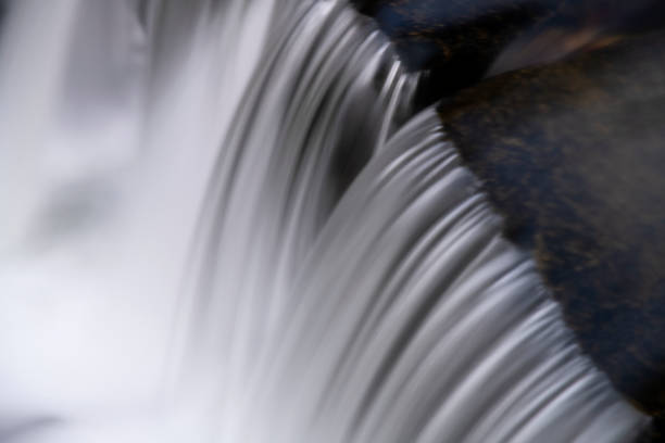 istock long exposure shot of waterfall 2203077064