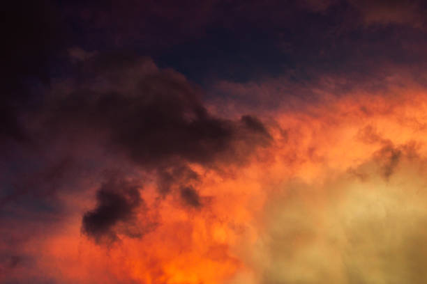 Fiery Sunset Clouds. A colorful sky with clouds. Cloud in the background. Phone or desktop wallpaper.