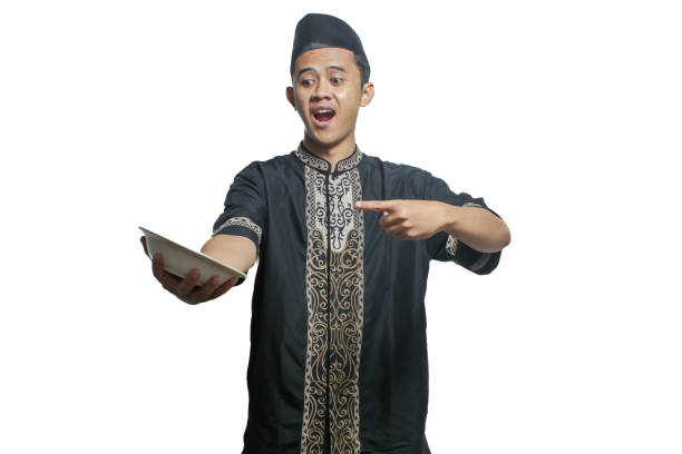 istock asian muslim man showing empty bowl isolated on white background 2203085800