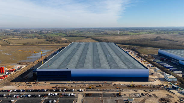istock Large distribution center under construction dominating the landscape 2203088306