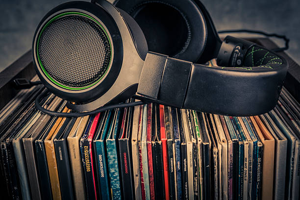 Vintage vinyl record on the table. Retro style toned image