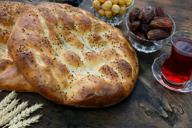 istock Pide - Turkish pita on rustic wood background 2203090892