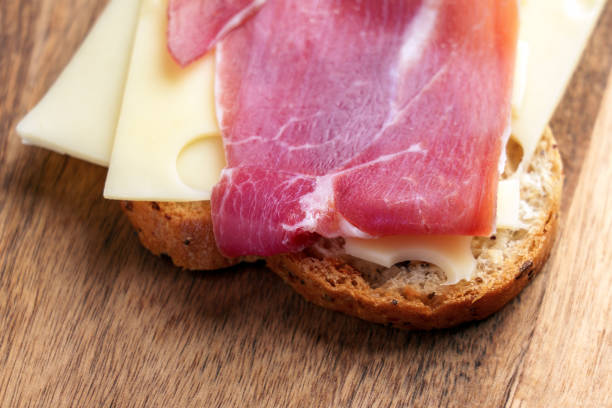 Tasty czech food oblozeny chleb bread with ham and cheese on white plate