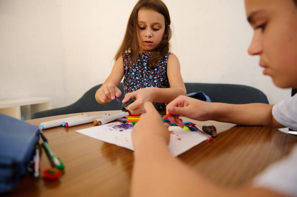 istock Children doing arts and crafts 2203093364