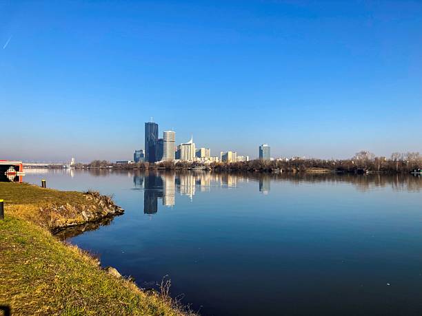 Danube city in Vienna with water reflection