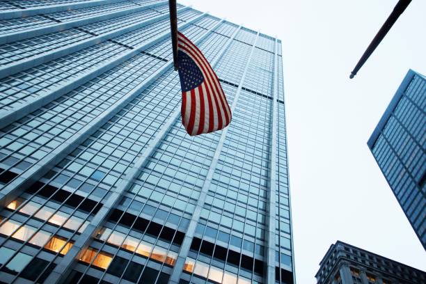 istock American Flag with Urban Skyscraper 2203099049