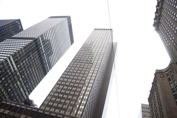 istock Urban skyscrapers under a cloudy sky 2203099075