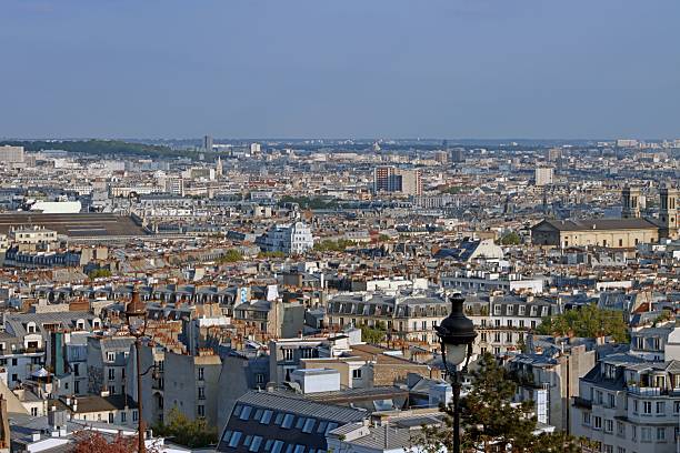 istock Panoramic Paris cityscape with historic architecture. 2203100094