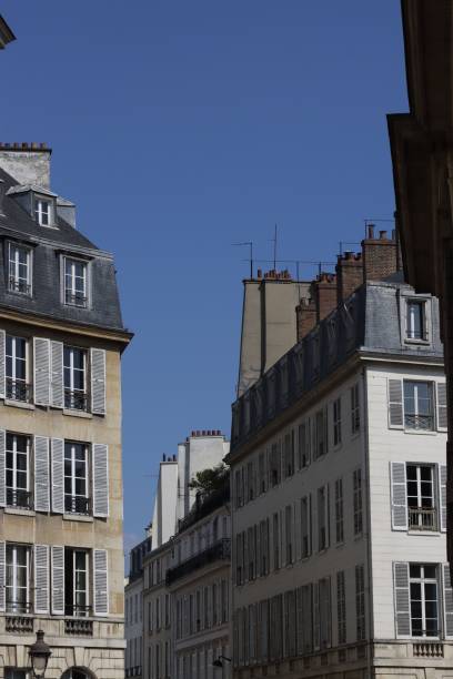 istock Charming Parisian street with classic architecture. 2203100112