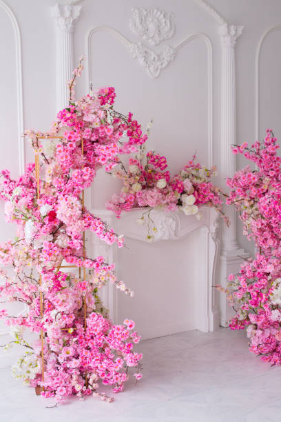 istock decor fireplace by pink flowers 2203100392