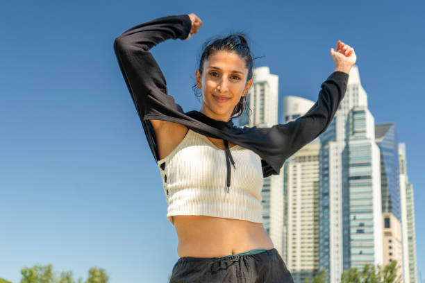 istock Confident dance moves in a vibrant city park 2203104607