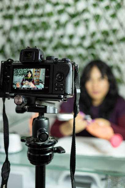 istock Female youtuber recording a tutorial on beauty products 2203106429