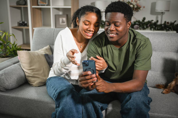 istock young couple on a date with smart phone 2203110996