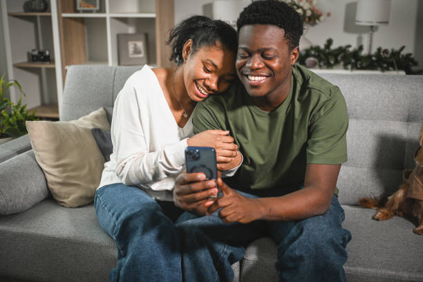 istock young couple on a date with smart phone 2203112358
