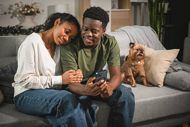istock young couple on a date with smart phone 2203112923