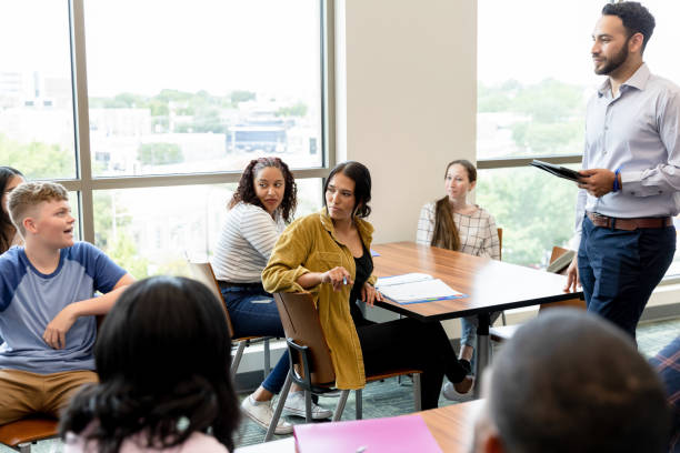 istock Group Therapy Session: Diverse People Discussing Mental Health 2203120229