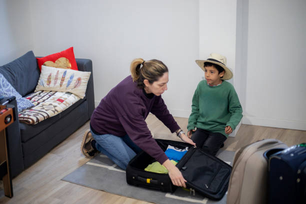 istock Mother and son packing for a trip 2203129145