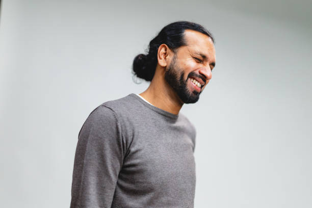 istock Portrait of Indian Man Laughing in Studio 2203129836