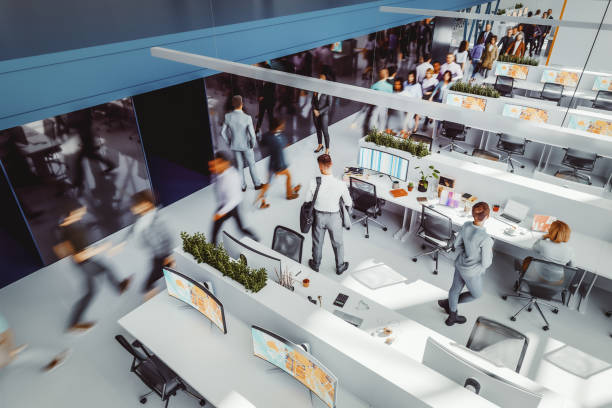 istock Busy office environment with people in motion 2203131136