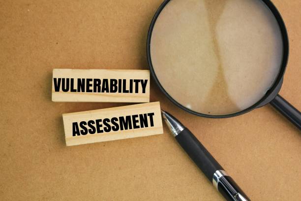 istock Pen, colored paper with the word vulnerability assessment. technology concept. safety management concept. 2203136469
