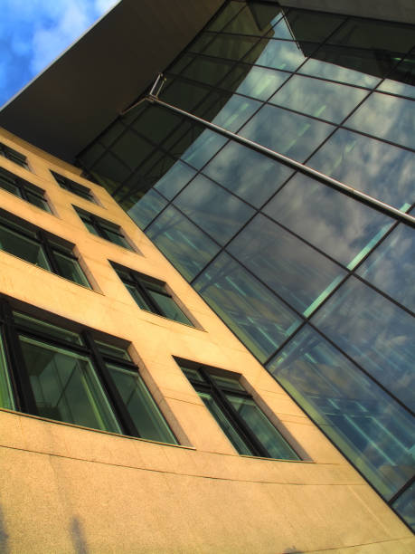 istock Modern office building architecture with glass facade and reflective details 2203140071