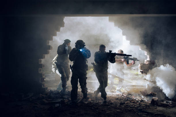 istock Group of soldiers attacking the building. 2203140559