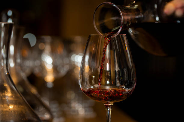 istock Pouring Red Wine in Glass 2203142033