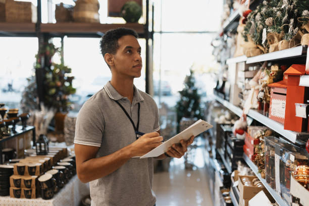 Man Taking Inventory in a Seasonal Decor Store