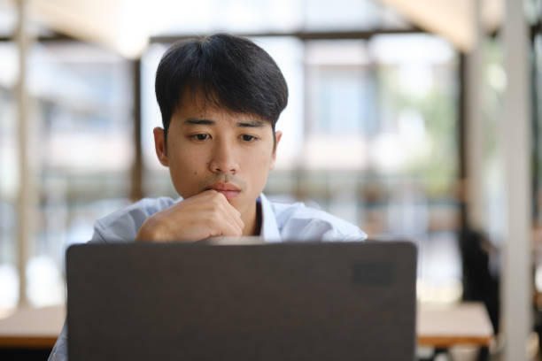 istock Business consultant analyzing financial data on a laptop 2203148218