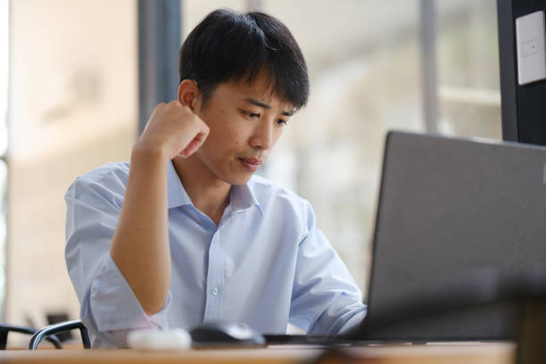 istock Business consultant analyzing financial data on a laptop 2203148222
