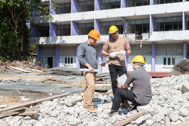 istock Demolition control supervisor and contractor discussing on demolish building. 2203148353