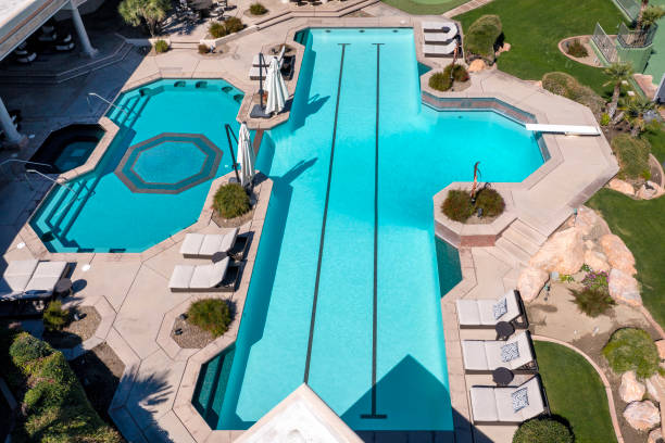 istock Luxury Home Aerial with Olympic size swimming pool 2203148418