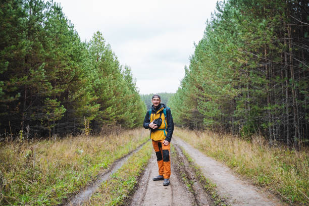 istock An Adventurous Hiker Sets Off on a LifeChanging Journey Through a Stunning and Breathtaking Forest, Fully Embracing Natures Quiet, Serene Beauty 2203149538