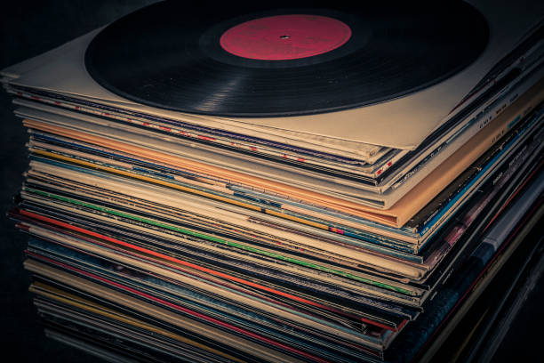 istock Vinyl record on the table. Retro style toned image. 2203150649