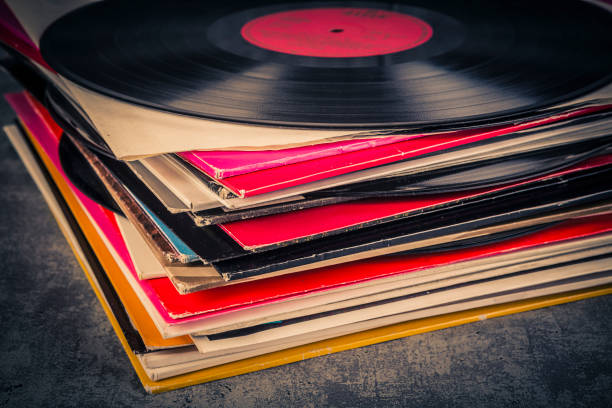 istock Vinyl record on the table. Retro style toned image. 2203150663