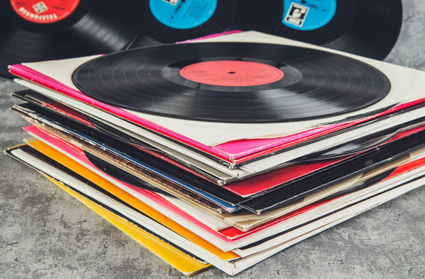 istock Vinyl record on the table. Retro style toned image. 2203150677